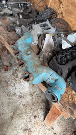 OMC 908997 marine exhaust manifold with OMC Exhaust Elbow 980617