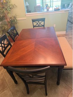 Dining room table with 4 chairs and bench seat