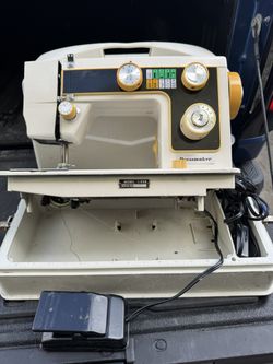 Sewing Machine With Cover