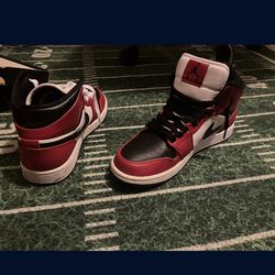 Red , white and black Jordan’s