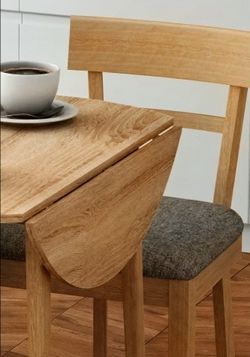 Oak wood solid drop leaf table and 2 chairs