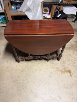Folding wooden table