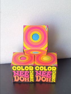 New Authentic Schylling Color Change NeeDoh stress balls are made of a soft, dough-like material. Pink, yellow, and blue color. Changes color when squ