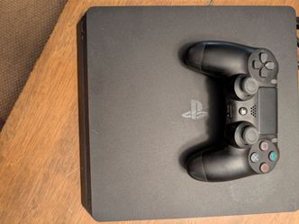 PlayStation 4 Slim 1TB Console - Excellent Working Condition