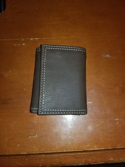 Levi wallet in tin container