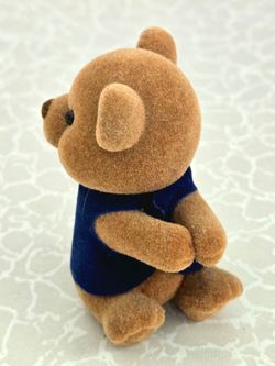 Teddy Bear Museum Flocked Bear Figurine
