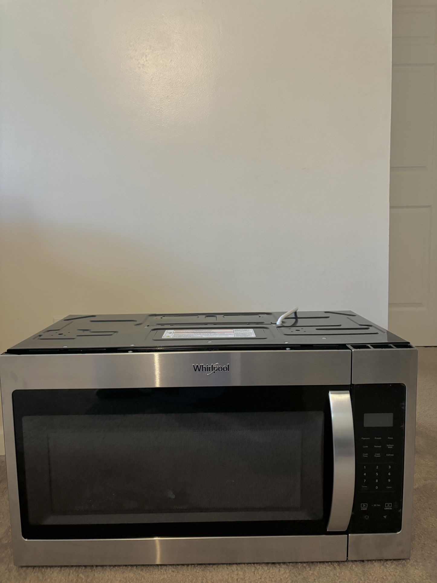 BRAND NEW Stainless Steel Whirlpool 1.7 cu. ft. Over the Range Microwave 