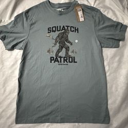 NWT Eddie Bauer Sasquatch Patrol Graphic T-Shirt Light Blue Bigfoot Men’s Size M  New with tags Eddie Bauer “Squatch Patrol” graphic T-shirt featuring