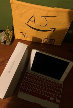 I pad mini 16 with wireless keyboard cover and original box