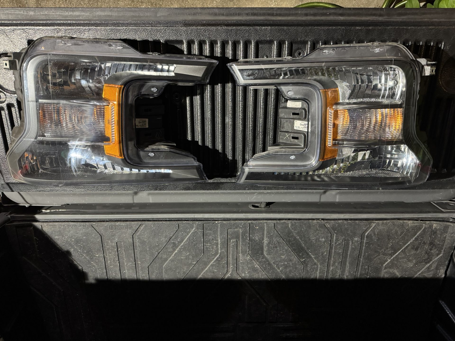 Used 2018 Ford F150 OEM Halogen Headlights Left and Right