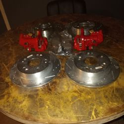 Calipers, Both Rear And Front Rotors And Rear And Front Brake Pads  Brand New