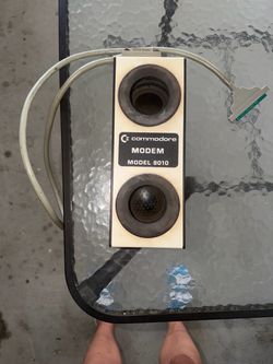 Commodore modem model 8010 for sale. Is dirty/stained from age/use