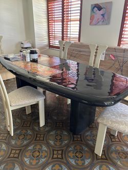 Black Gloss Oval Dining Table with Chairs