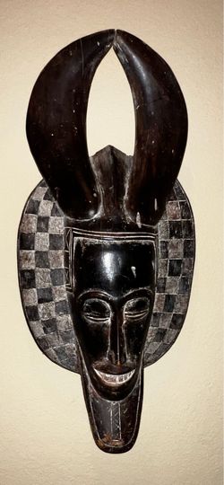 Vintage Hand-carved wooden dance mask from West Africa, crafted by Yaure people of Côte d'Ivoire (Ivory Coast).