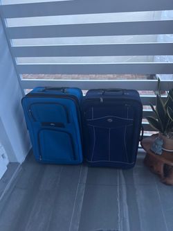 2 maletas de viaje x 15$ las 2