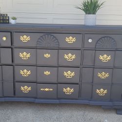 OVERSIZE GRAY TITANIUM 10 DRAWERS  DRESSER WITH GOLD KNOBS .ALL SOLID WOOD. GOOD SHAPE 70X20X37 