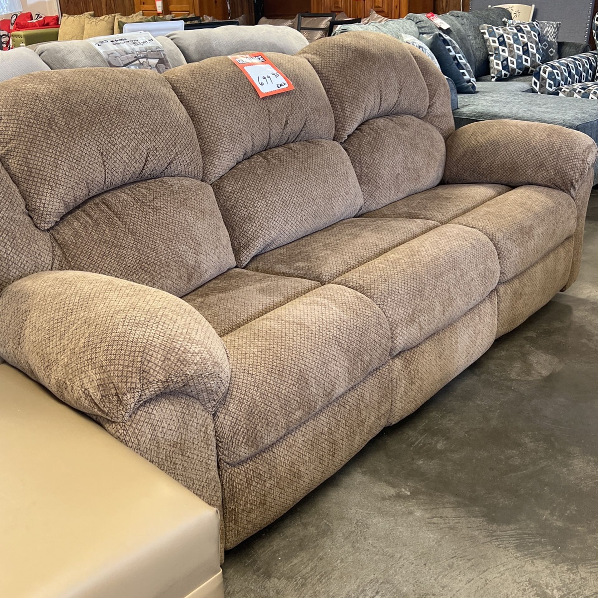 Brand new reclining couch, and loveseat