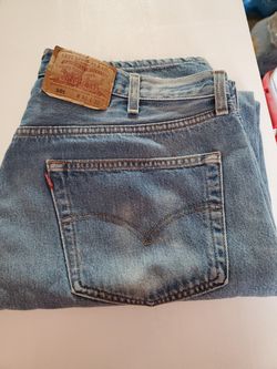 MEN'S 501 DEMIN BUTTON FLY LEVI'S AND, 40W X 32L. STILL IN GREAT SHAPE