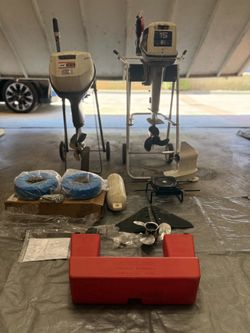 15 hp Evinrude and 9.9 hp Johnson Outboard + parts and accesories