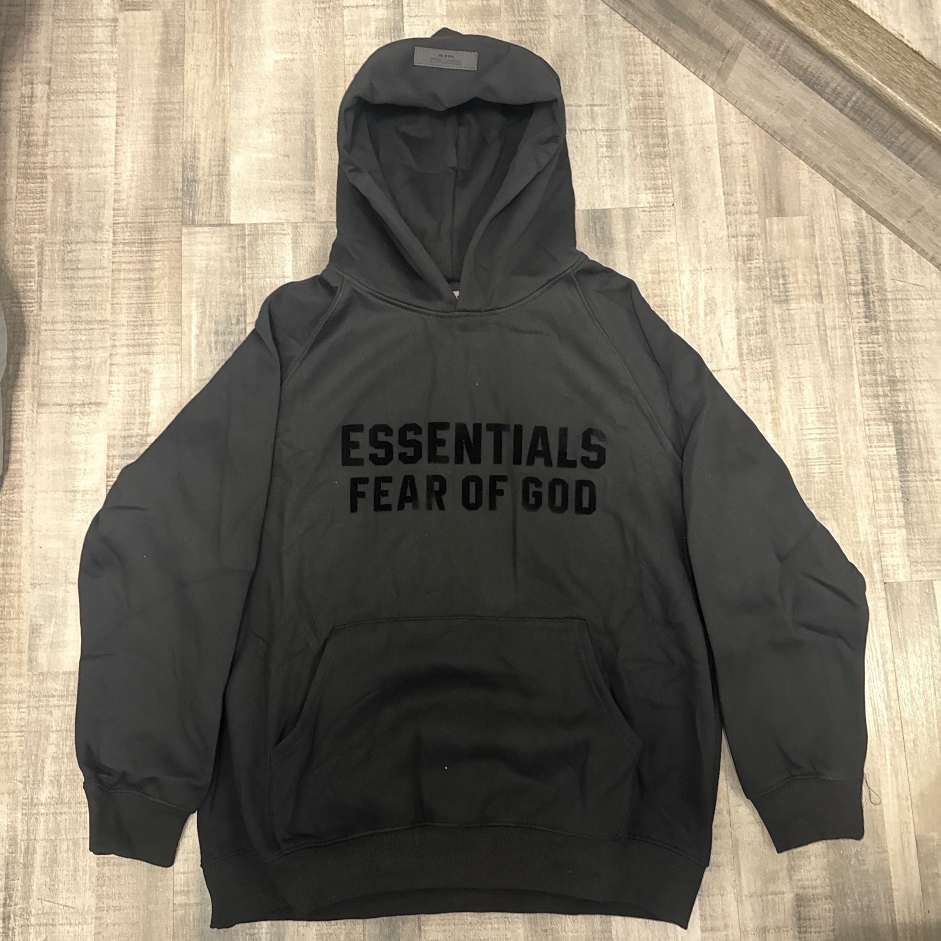 black essential hoodie