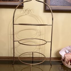 Three-tiered brass serving stand (bowls not included) 23” tall, 12.5” wide, 9” circles