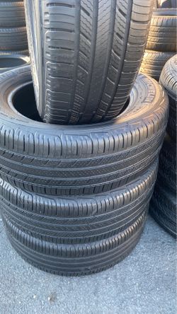 a set brand Michelin tires size 215/60R16