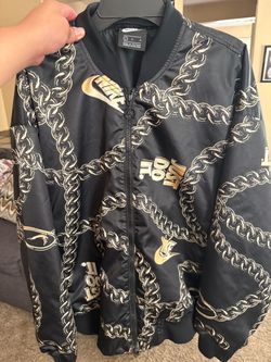 Black and gold chain Nike jacket