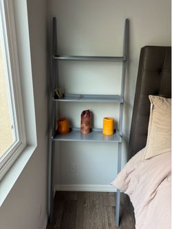 Grey leaning shelf stand bathroom