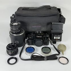 Canon A-1 Black 35mm SLR Film Camera with FD 50mm 1.4 & Vivitar 28mm 2.8 MC Lens