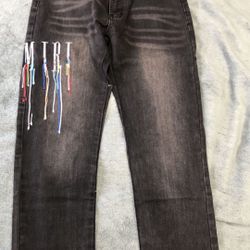 Amiri Dripping Logo Jeans. 30,32,34