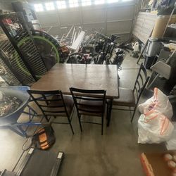 Brown Table With 4 Chairs