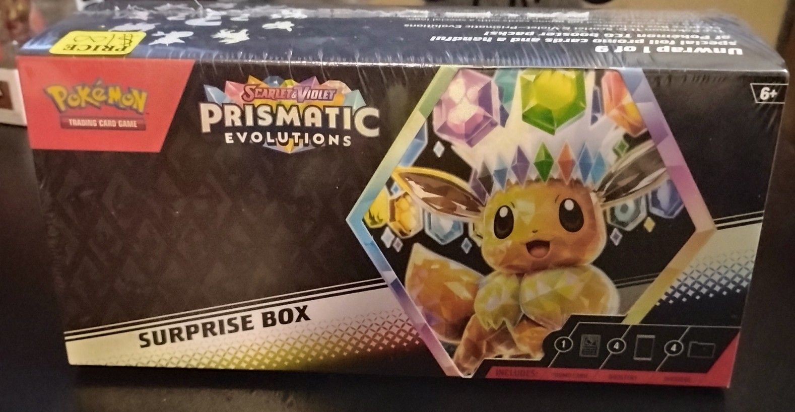 Scarlet And Violet Prismatic Evolutions Surprise Box.