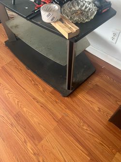 TV table can support a big screen. I had a 65 on it and it was fine. Come get it trade for stuff or you can come get it.
