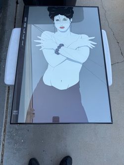 framed art print titled "Jeana" by the iconic 1980s pop-art and postmodern artist Patrick Nagel.