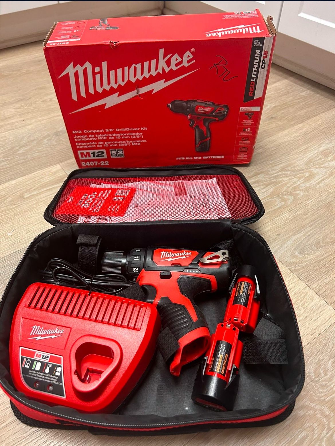 Milwaukee M12 12V Lithium-Ion Cordless 3/8 in. Drill/Driver Kit with Two 1.5 Ah Batteries, Charger