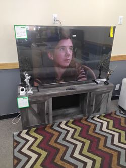 Large Flat Screen TV with TV Stand