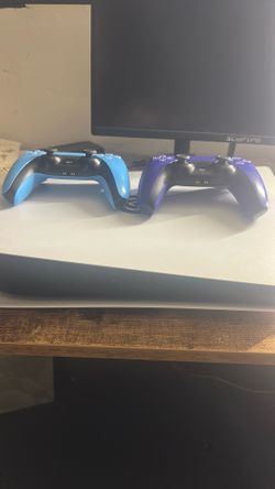 PS5 Console with Two DualSense Controllers