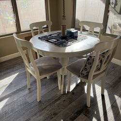 Table And Four Chairs