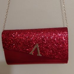 Brand new red color bag with matching earrings and necklace and bracelet 