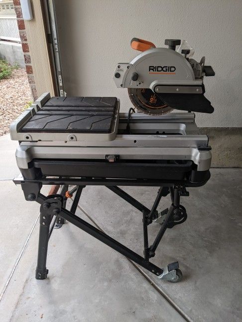 RIGID 10 inch wet tile/stone saw and stand w/ laser