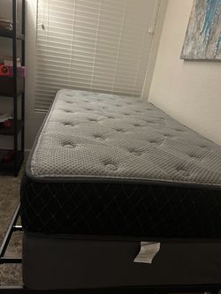 Twin size mattress, foundation, set of sheets, mattress protector, metal base.
