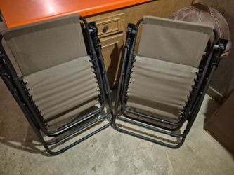 Lawn chairs and great condition, don't need, easy to unfold and extend, great for patio or porch in good condition.