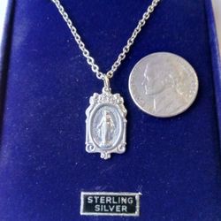 Sterling Silver Miraculous Medal on an 18 inch Stainless Steel Chain. Religious jewelry.