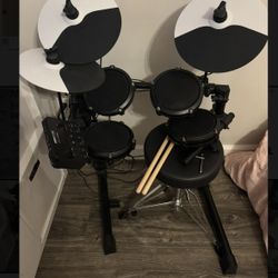 Alesis Drums Debut Kit - Electric Drum Kit with 4 Quiet Mesh Electronic Pads, 120 Sounds, Drum Sticks, Stool,