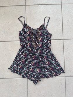 American Eagle Size M Floral Romper with Lace-Up Front & Open Back