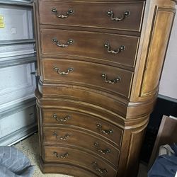 chest of drawer or two bedside drawers