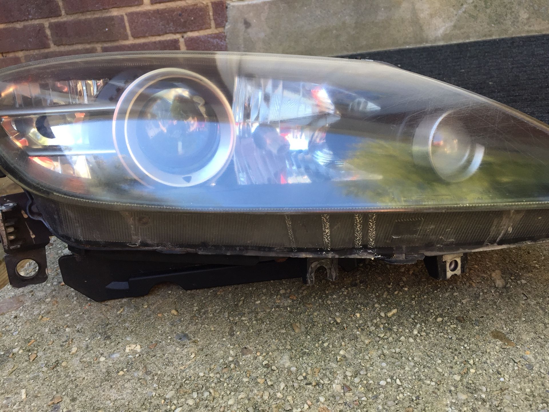 Mazda Rx8 passenger headlight