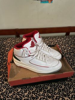 Jordan 2 Retro white sneakers with red accents