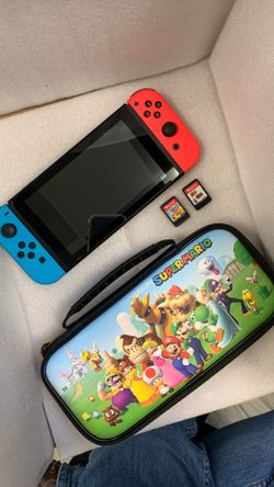 Nintendo Switch with 2 games, travel case and Charger - Babcock rd