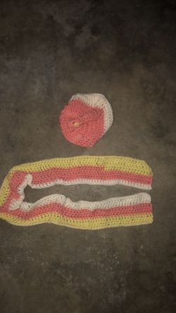 Handmade kid’s scarf and hat in like new condition. The hat can fit many sizes because it stretches easily.